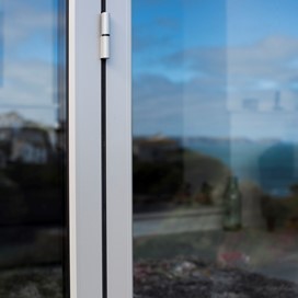 Close up of a closed white bifold door