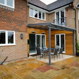 A view of a patio with a glass canopy from Origin