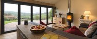 A close view out through Origin's closed doors from within a barn conversion