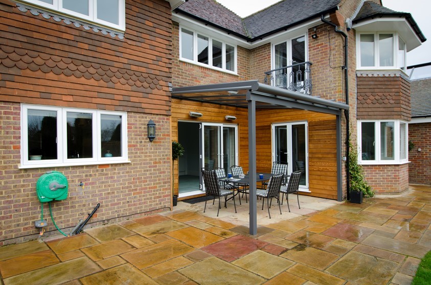 A view of a patio with a glass canopy from Origin