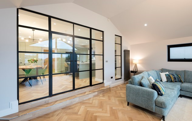 Origin Black Internal Aluminium Doors fit seamlessly as a partition wall between living area and kitchen