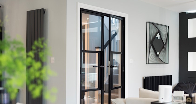 Origin Internal doors are bang on trend whilst allowing light to flood through this Country home. 